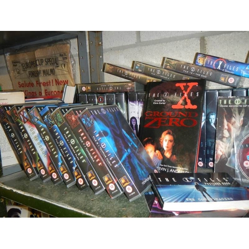 18 - A shelf of X Files videos.