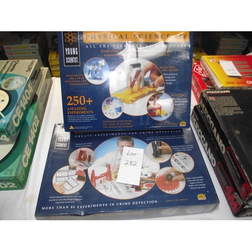 282 - A Merit physics science kit and forensic science kit, both factory sealed, sold as seen, collect onl... 