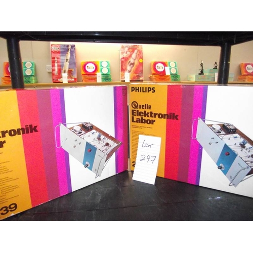 297 - 2 Philips electronic kits (German) 24739, both sealed inside, being sold as seen, collect only