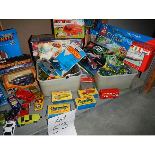 53 - A mixed lot of vintage toys including Matchbox, marbles, Star Wars, Lego etc.,