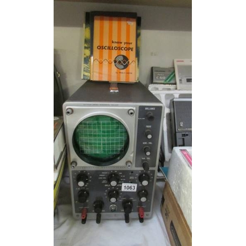 1063 - A Heathkit Osciloscope, model No. 10-12U with 2 books, working condition unknown.