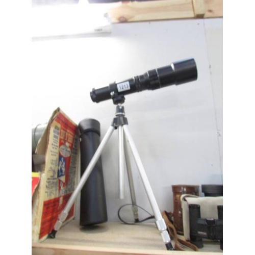 1213 - A telescope on tripod.