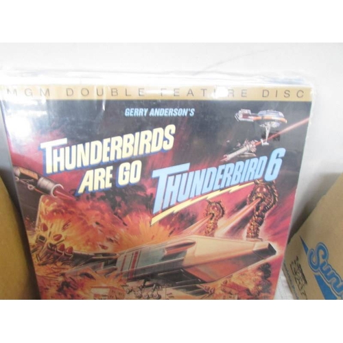 1226 - A 1991 Thunderbird calendar together with Thunderbird and Stingray LP records.