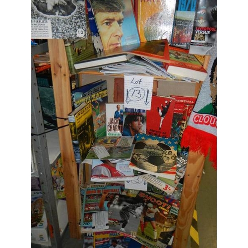 13 - Five shelves of football magazines, hardback and paperback books etc.,
