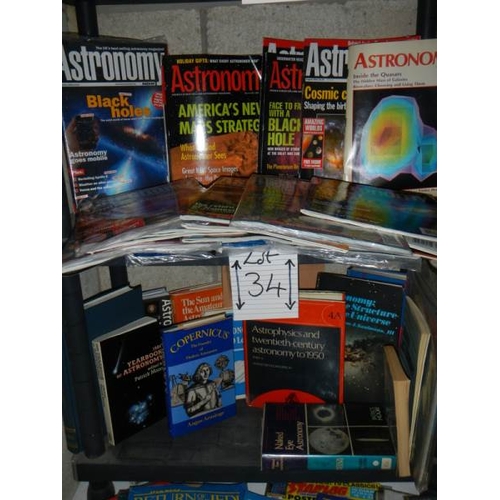 34 - Two shelves of astronomy related books and magazines.