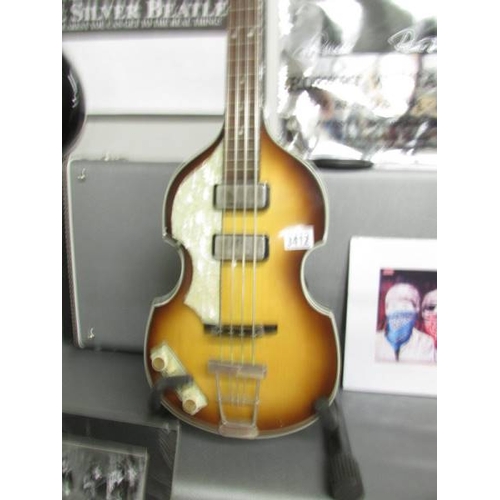 3412 - A left handed Hofner ''Beatle Bass'' guitar with original hard case (new old stock).