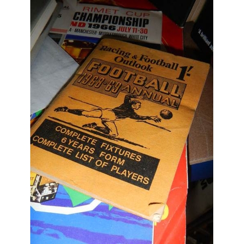 4 - A very interesting lot of football memorabilia on 2 shelves, in excess of 40 books in total, all in ... 