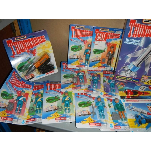 41 - A large shelf of assorted Thunderbird toys,.
