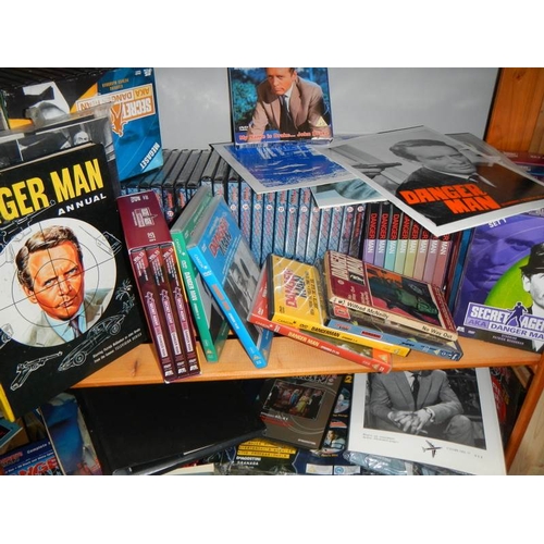 67 - Five shelves of books including The Prisoner, Dangerman etc.,