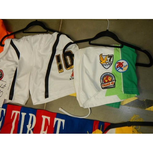 80 - A mixed lot of football related items including shorts, scarf etc.,