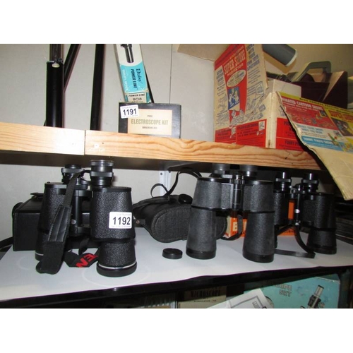 1192 - 2 pairs of good cased binoculars.