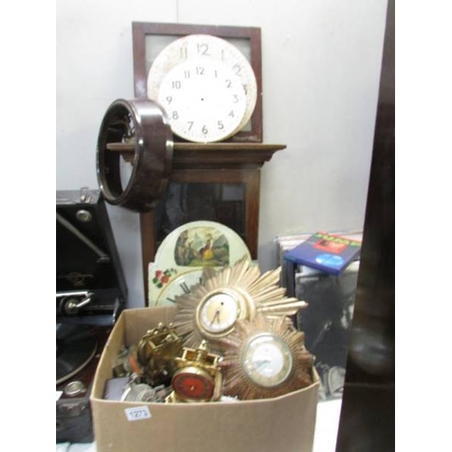 1273 - A large quantity of clock parts, empty case, faces and 2 starburst clocks, all a/f