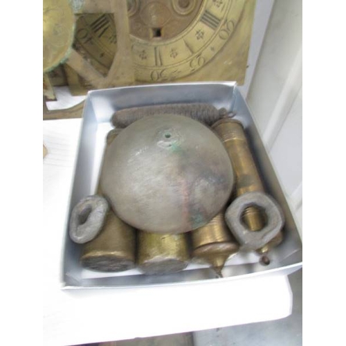 1293 - A quantity of Grandfather clock weights and a bell.