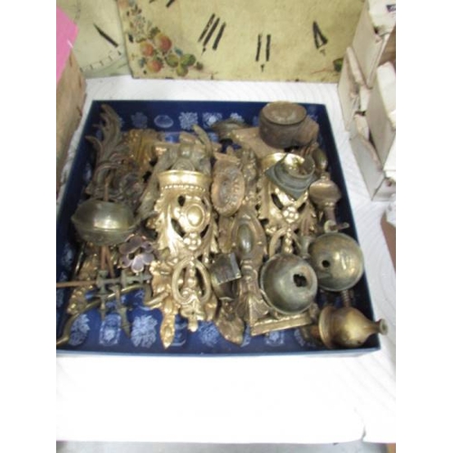 1297 - A box of brass and ormolu fittings.