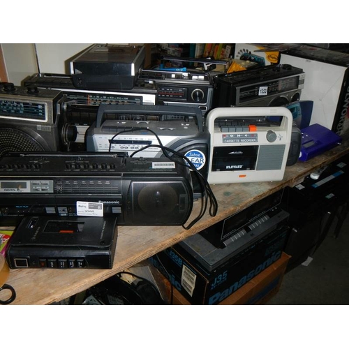 1353 - A large quantity of old radios, cassette players etc., for spares or repair.