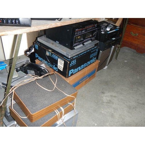 1353 - A large quantity of old radios, cassette players etc., for spares or repair.