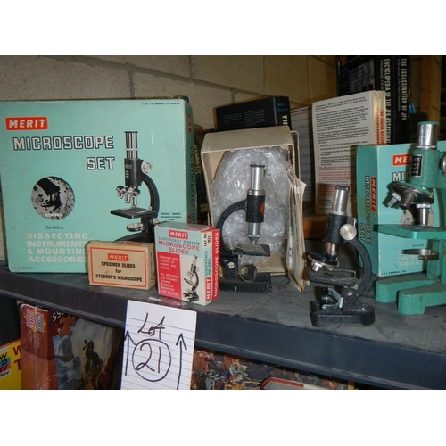 21 - 3 boxed collectable microscopes and 2 unboxed.