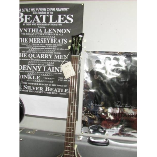 3412 - A left handed Hofner ''Beatle Bass'' guitar with original hard case (new old stock).