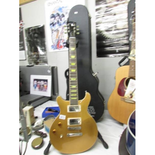 3413 - A USA Gold Gibson ''Classic'' Les Paul left hand guitar with original hard case.