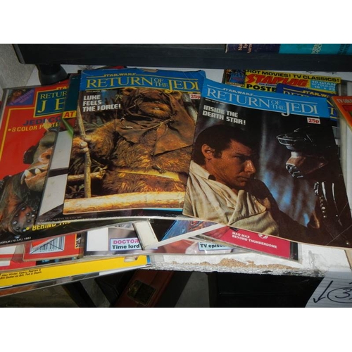 35 - A long shelf of assorted comics including Joe 90, Return of the Jedi, Lion, Batman etc.,