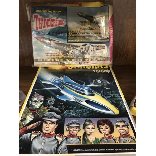 355 - 5 Waddingtons Thunderbirds jigsaws, completeness unknown and a Stingray jigsaw factory sealed