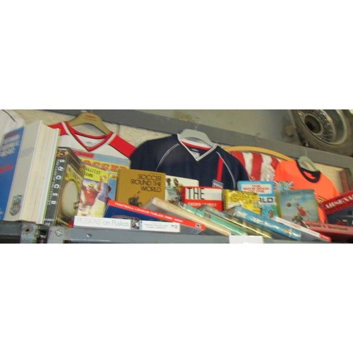 3808 - A good lot of football related items including Barcelona and Sheffield United shirts, books, videos ... 