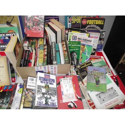 500 - A large collection of football related book and videos, also includes wall posted signed by Saint & ... 