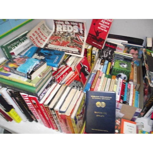 500 - A large collection of football related book and videos, also includes wall posted signed by Saint & ... 