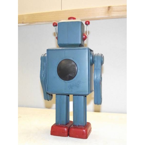 574 - A tinplate model robot money box.