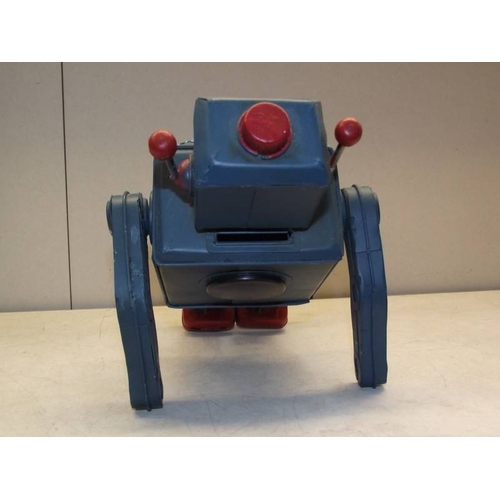 574 - A tinplate model robot money box.