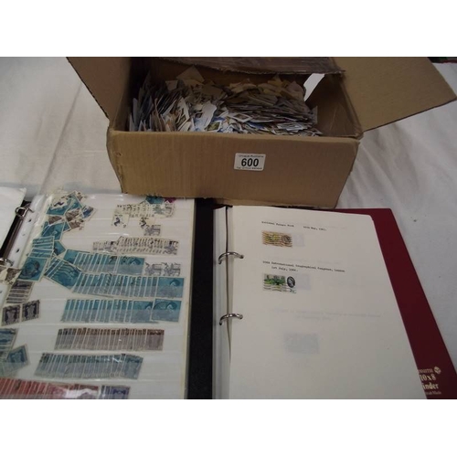 600 - 2 stamp albums and a box of loose stamps.