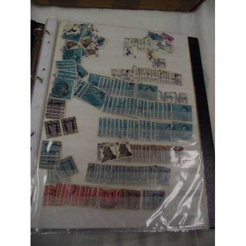 600 - 2 stamp albums and a box of loose stamps.