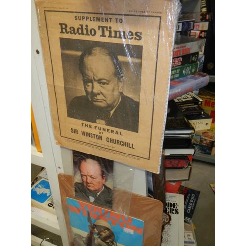 77 - Four shelves of books relating to Winston Churchill, World wars etc., including hard back, paper bac... 