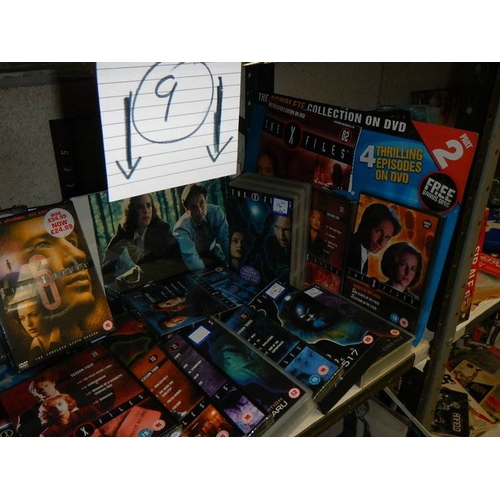 9 - On shelf on Magazines, books, videos, CD's etc., relating to The X Files.