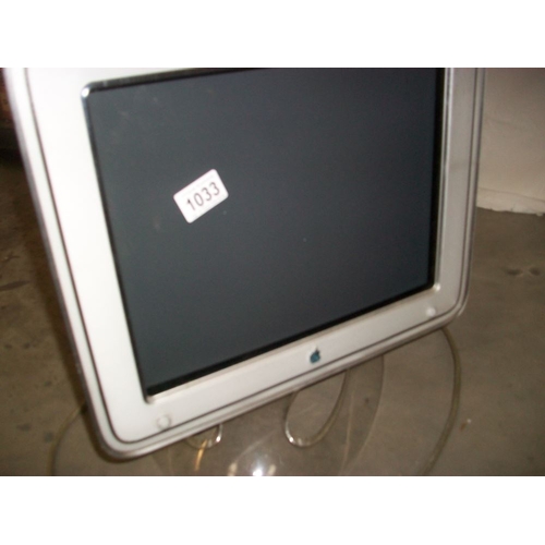 1033 - An Apple computer monitor.