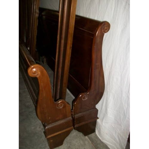 503 - A French Louis Baton solid mahogany bedstead, 6 foot wide and complete.