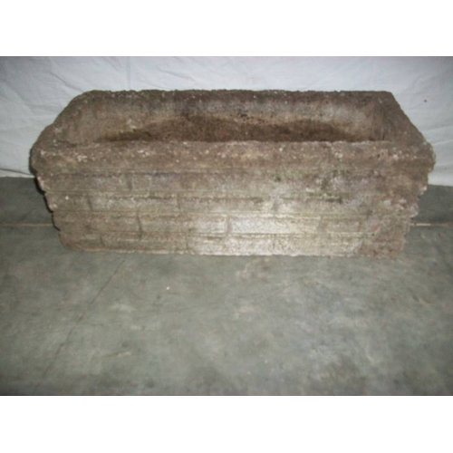 507 - A concrete planter 61 x 28 cm x 22 cm high,