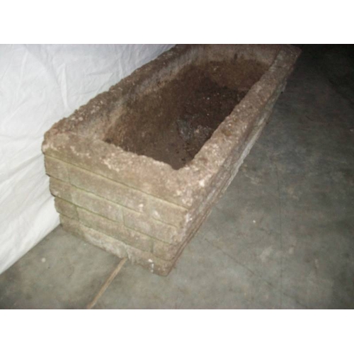 507 - A concrete planter 61 x 28 cm x 22 cm high,