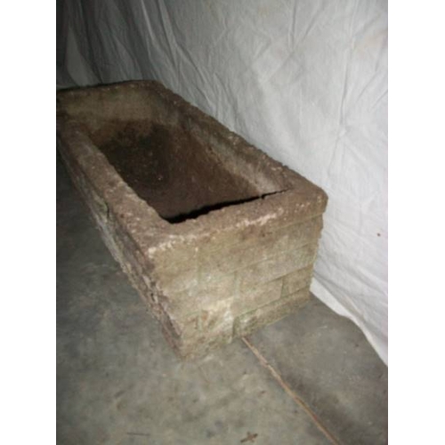 507 - A concrete planter 61 x 28 cm x 22 cm high,