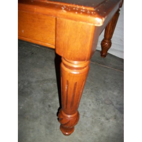 508 - A good solid mahogany side table on tapered legs with carving to top,  122 cm long, 67 cm wide and 4... 