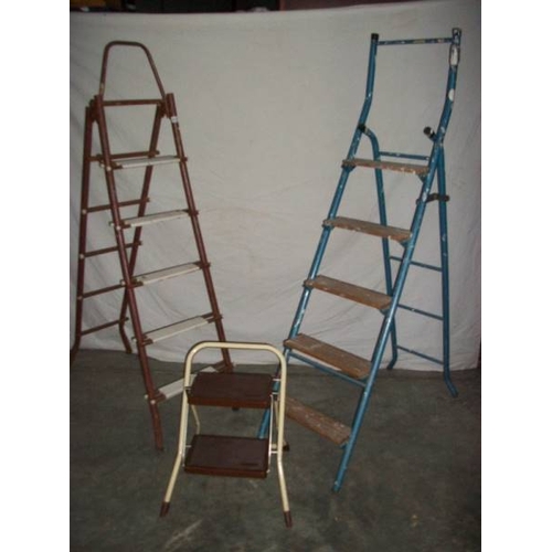 510 - 3 metal step ladders, 2 x 3 step and 1 x 2 step.