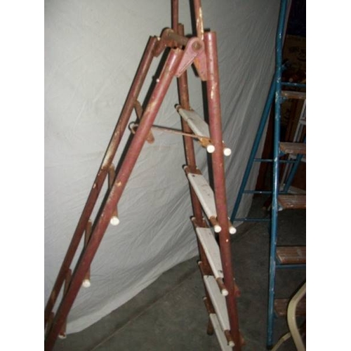 510 - 3 metal step ladders, 2 x 3 step and 1 x 2 step.