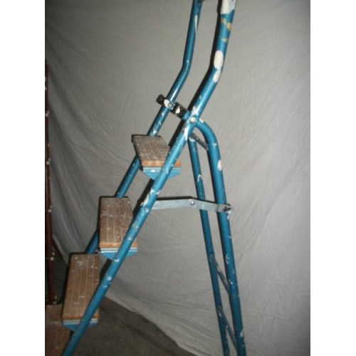 510 - 3 metal step ladders, 2 x 3 step and 1 x 2 step.