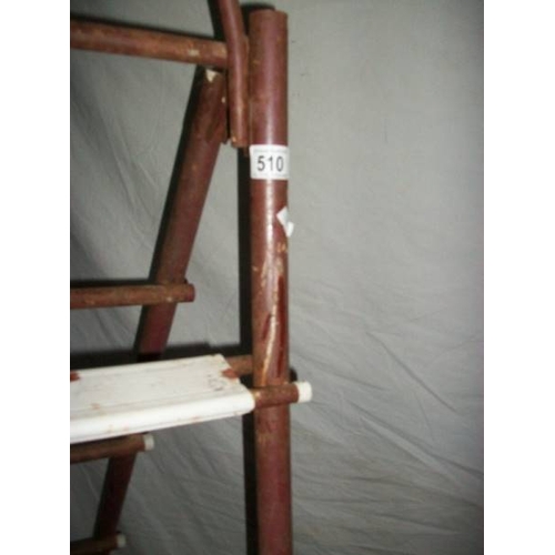 510 - 3 metal step ladders, 2 x 3 step and 1 x 2 step.