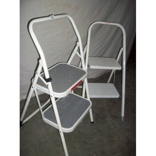 511 - 2 steel 2 tread step ladders.