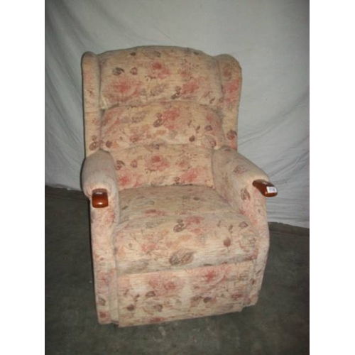 514 - A good mid to late 20th century armchair together with a matching recline/raise armchair, both in go... 