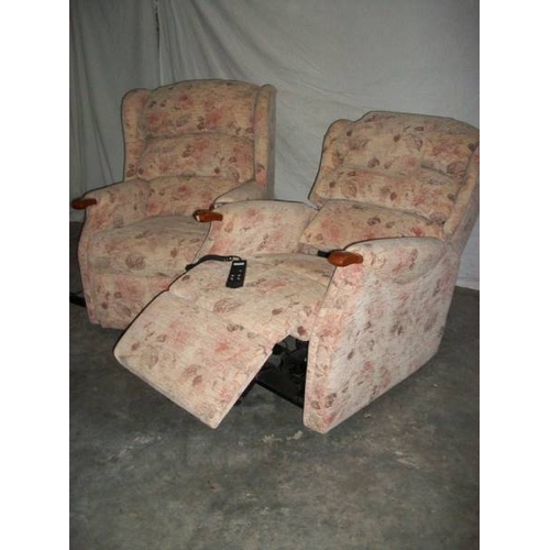 514 - A good mid to late 20th century armchair together with a matching recline/raise armchair, both in go... 