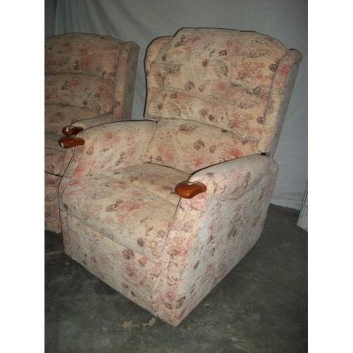 514 - A good mid to late 20th century armchair together with a matching recline/raise armchair, both in go... 