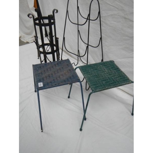 519 - An umbrella stand, 2 woven stop stools and a steel rack.