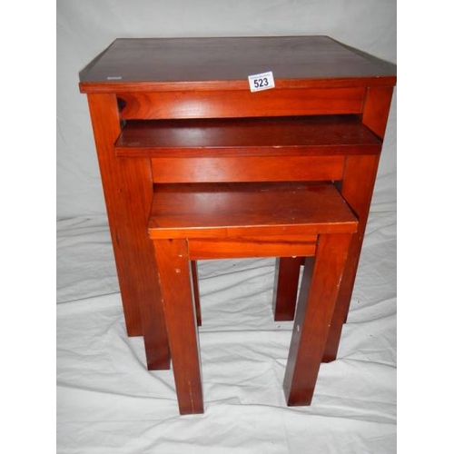 523 - A nest of 3 mahogany tables in good condition.